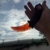 【 Fire-burned wood handle 】 Ruby material Karambitt