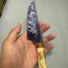 【 Burnt wood Handle 】 A purple-glowing dagger made of cat's eye stone